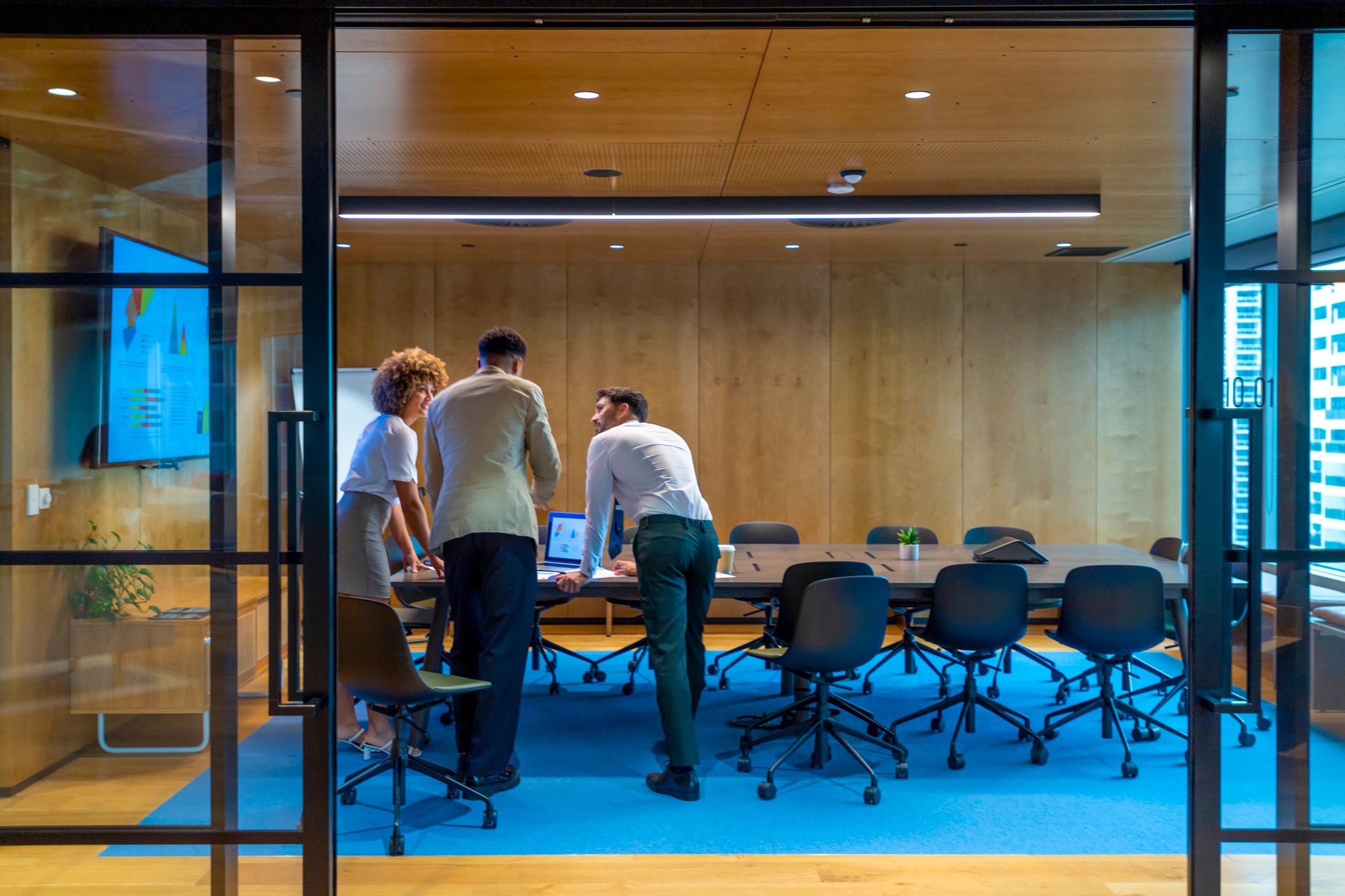 Consulting team reviewing security strategy in a modern office