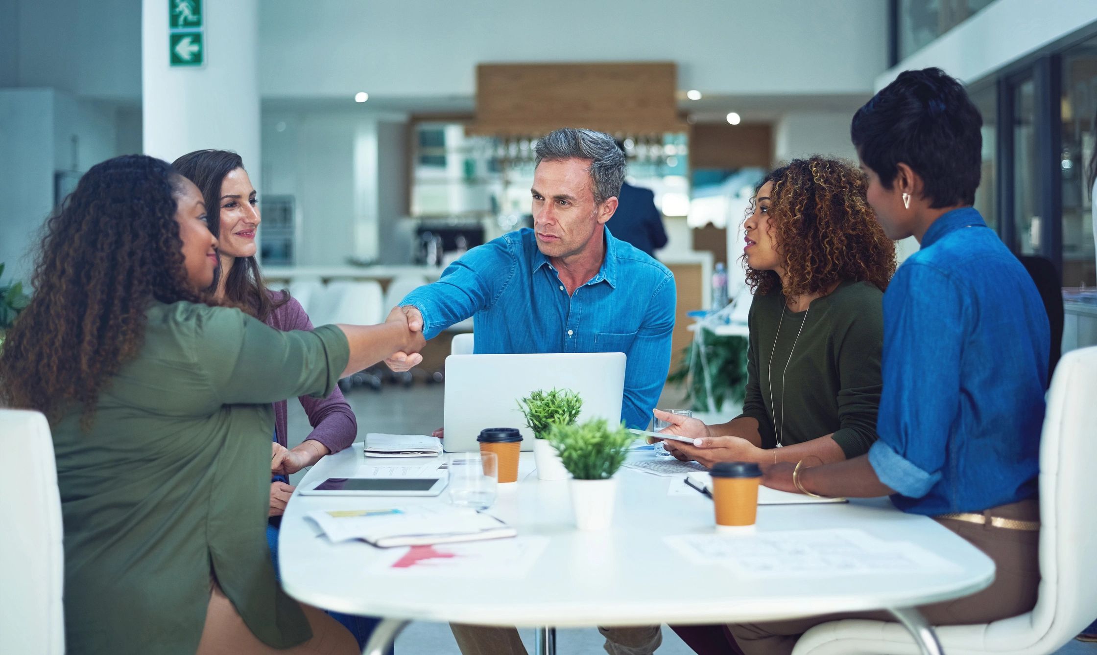 Business leaders reviewing AI governance and enterprise risk
